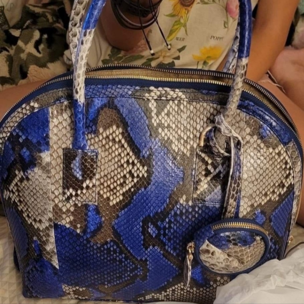 Pelle python collection rare and hard to find in blue 100% authentic